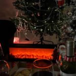 A warm Art Deco style fireplace light